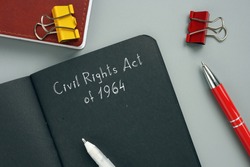 Legal concept about Civil Rights Act of 1964 with inscription on the piece of paper.