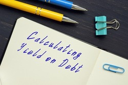  Financial concept meaning Calculating Yield on Debt with inscription on the piece of paper.