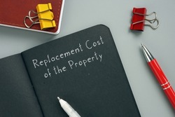  Juridical concept about Replacement Cost of the Property with inscription on the piece of paper.