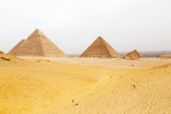 Pyramids on the Giza Plateau at Cairo, Egypt. The ancient structures form part of a UNESCO World Heritage Site.