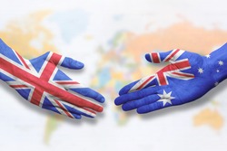 Australia and UK - Flag handshake symbolizing partnership and cooperation with the United Kingdom