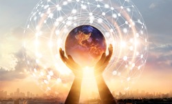 Abstract science. Hands touching earth and circle global network connection, data exchanges worldwide on city sunset background. Innovation. Creative and inspiration idea and Networking