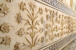 Taj Mahal mausoleum details. Marbles ornament carving. Agra, India