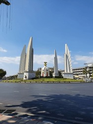 Democracy monument in Bangkok, Thailand with blue sky and sunshine day