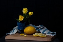 Still life photo of roses and lemons