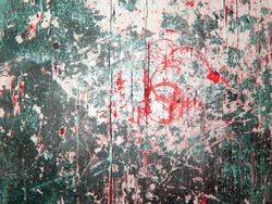 Background wallpaper of wooden board planks with a scratched aged grunge texture and cracked silver green white grey paint with a red bleeds bloody wood structure.