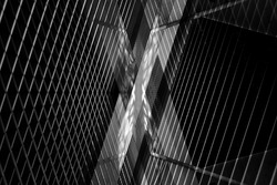 Reworked close-up photo of pitched ceiling / roof with louvered structure. Modern architecture. Abstract black and white background image on the subject of office or industrial interior.
