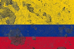 Colombia flag on a damaged old concrete wall surface