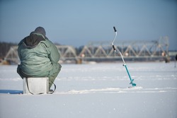 Fisherman enjoying a days fishing on the ice