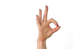 Womans hand ok sign on white background.