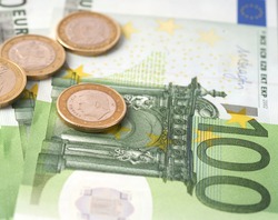 Money laundering on clothesline on light background. 100 eur notes. 100 eur banknotes.