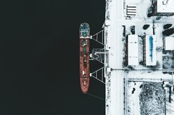 Cargo ship in the harbor at winter.