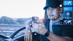 Asian man using smartphones check data digital. High-tech truck driver Find location 3D world map application touch screen display realistic. Transport, Delivery, and driving tracking technology.