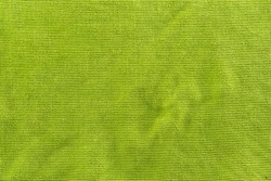 Green microfiber nano cleaning cloth texture and background.