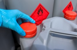 Open the lid of hazardous chemical tanks used in industry and laboratories