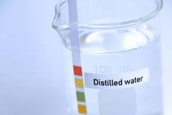 Distilled water in bottle ,sample pH water in the laboratory and industry