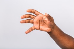 African american black man hand hanging something blank isolated on a white background. Close-up.