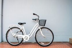 white bicycle on white wall background