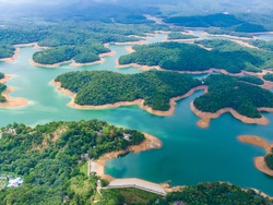 dam lake mountains kerala india turquoise blue water islands forest green pattern beautiful sunny day summer weather drone shot aerial view top angle clouds irrigation 