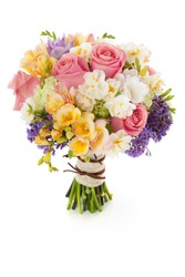 Pastel colors wedding bouquet made of Roses, Freesia, Carnation and Limonium flowers isolated on white.