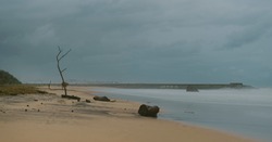 Empty sandy beach in the paradise island of Sri Lanka, evening long exposure photograph. concept of the covid situation in the beautiful beaches,