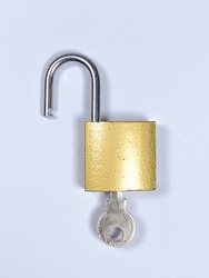 golden padlock and key. Isolated on white background