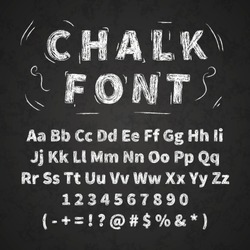 Set of retro hand drawn alphabet letters drawing with white chalk on black chalkboard