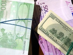 Euro money and US dollars : bunch of banknotes