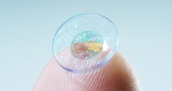 
contact lens with digital and biometric implants to scan the ocular retina.
concept of future and technology for digital scans.