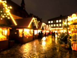 Defocused blur background of Christmas market. Night scene.