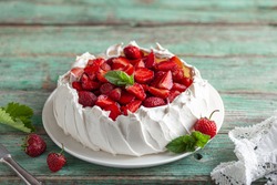 delicious Pavlova cake with fresh strawberry, seective focus