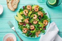 fresh healthy avocado and shrimps salad. Top view