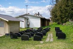 Polva/Estonia-05.10.2020: Graveyard gravestone store. Lots of black polished gravestones stored up behind cemetery. Prepared for lots of deaths. Corona virus deaths preperations. Grave stones lined up