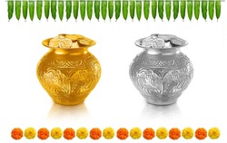 gold coins filled in gold pot (kalash) and silver coin filled in silver pot (kalash) an mango leaf thorana and marigold flowers for hindu festivals and poojas