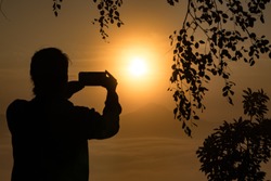 Taking a Picture of the Sunrise