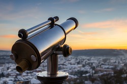 Monocular telescope at sunset over Marburg, Germany