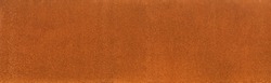 Background rust texture as a panorama homogeneous rust surface made of corten steel