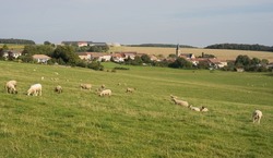 Small village Beux in Lorraine France with church houses a lot of photovoltaic agriculture sheep farming and biogas plant