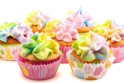 Pastel Rainbow Frosted Easter Cupcakes  Isolated on a White Background