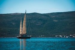 old wooden sailboat on the sea