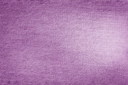 Denim background texture for design. Canvas denim. Denim purple jeans fabric. 