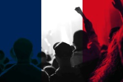 Protests France Paris. France flag. Protest in France. Rise hand. Pension reforms. Retirement age. Bastille day. Out of focus.
