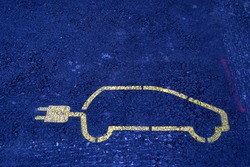 Electric car pictogram with electric plug instead of an exhaust. It is marking of a park place for a car with charging station for alternative ecological power instead of conventional fuel.