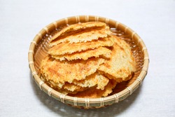 Close up of stacked Nurungji(crust of overcooked rice) in a bamboo basket, South Korea
