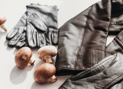 mycelium leather, bio based sustainable alternative leather made of mushrooms. plant textile. Jacket and gloves. eco biodegradable vegan leather. 