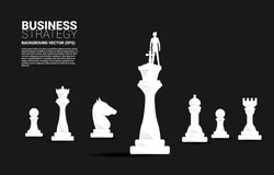 Silhouette of businessman on chess piece king. Business Concept of strategy planning and success