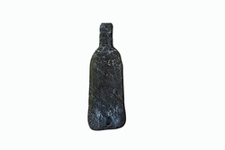 Deformed wine glass bottle after heat treatment. Molten flat bottle as design element. Object for decoration, mosaic or stained glass windows.