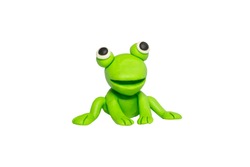 Statues like cute animals for children. Molding from plasticine. Cartoon characters, Frog isolated on white background with clipping path.