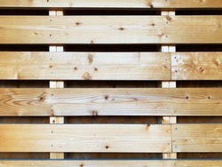 a wooden barn door wall slat wall wood plank board ranch boards shed building material background construction backdrop