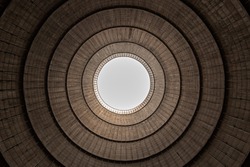 Cooling tower of a power station, view from bottom to top.